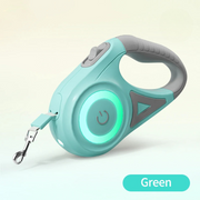 Green automatic retractable dog leash with LED flashlight and ergonomic handle for nighttime walking safety