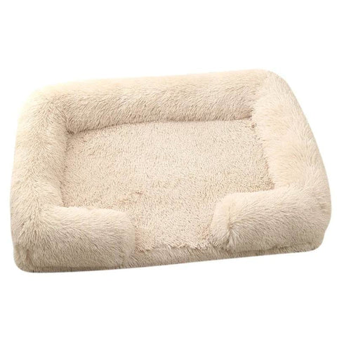 Soft beige orthopedic soft dog sofa bed with plush cushioning and raised edges for medium-sized dogs