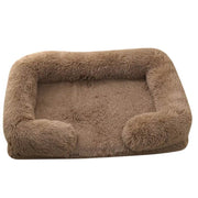 Soft brown orthopedic dog sofa bed with plush cushion and raised edges for medium-sized dogs