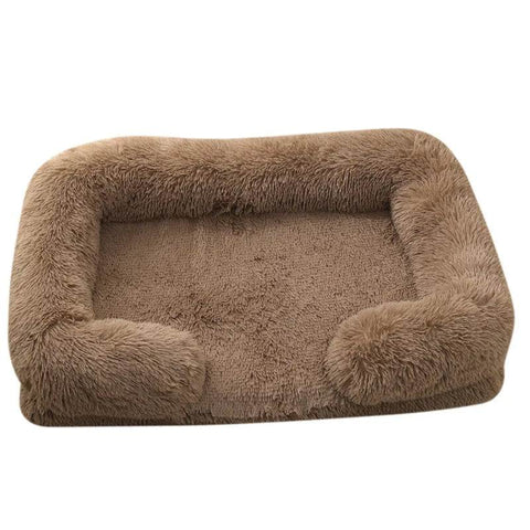 Soft brown orthopedic dog sofa bed with plush cushion and raised edges for medium-sized dogs