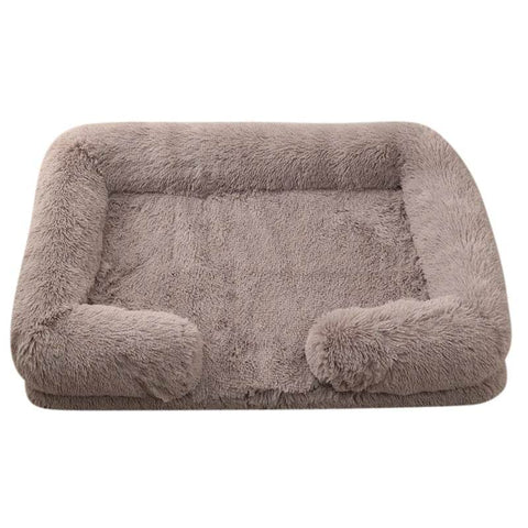 Soft dog sofa bed with orthopedic foam base, plush cozy design, and nonskid bottom for medium-sized dogs.