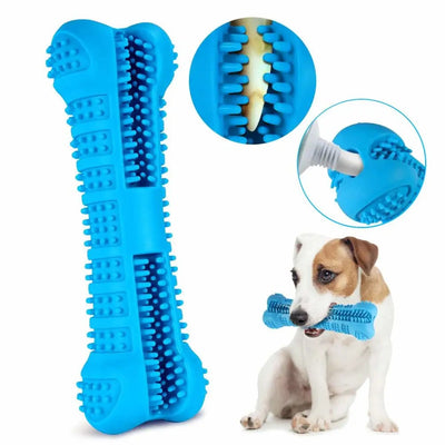 Blue soft rubber dog toothbrush chew toy shaped like a bone with bristles for dental care and a dog chewing on it