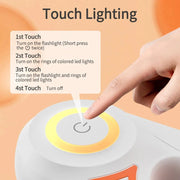 Close-up of a hand touching the power button on an automatic retractable dog leash with LED light control ring.