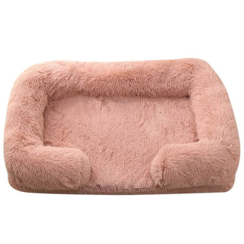 Soft dog sofa bed with orthopedic foam base and plush pink cover for medium-sized dogs